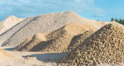 pile of limestone quarry on background of blue sky